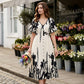 👗 49% de réduction✨Robe midi élégante à col en V et imprimé botanique🍂