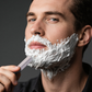 Support pliable et résistant pour tondeuse à barbe