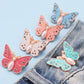 Bouton en forme de papillon qui s'adapte parfaitement
