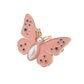 Bouton en forme de papillon qui s'adapte parfaitement