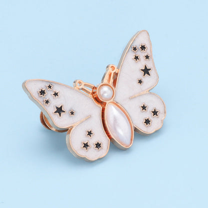 Bouton en forme de papillon qui s'adapte parfaitement